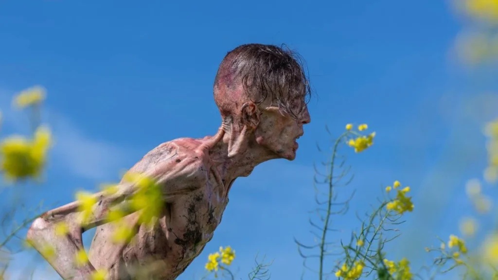 28 Years Later 2025 Movie Review showing a zombie Image Source: © TMDB / TheMovieDB.org