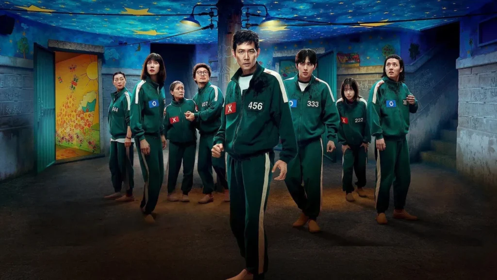 Squid Game Season 3 Cast: Lee Jung-jae (Player 456), Wi Ha-joon (Detective Jun-ho), Park Hae-soo (Cho Sang-woo), Jung Ho-yeon (Kang Sae-byeok), Kim Joo-ryoung (Han Mi-nyeo) and others - Image via TMDB.Image Credit: Β© TMDb (www.themoviedb.org) β Used for informational/review purposes only.