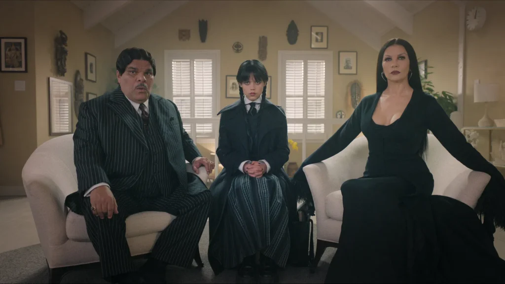 Wednesday Season 2 Release Date Netflix.Wednesday her aunt and uncle sitting on soffa in a picture from season 1.Image Credit: Β© TMDb (www.themoviedb.org) β Used for informational/review purposes only.