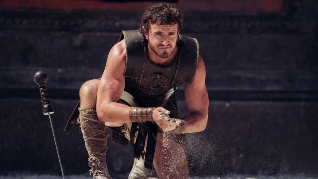 Gladiator 2 (2025) Movie Review.Showing the main actor in colossium ready for fight.Image Credit: Β© TMDb (www.themoviedb.org) β Used for informational/review purposes only.