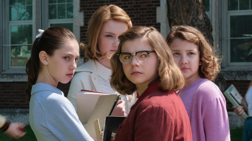 Upcoming Fantasy & Sci-Fi Series of 2025.A scene from the series IT.welcome to Derry .girls are standing outside of the building.Image Credit: © TMDb (www.themoviedb.org) – Used for informational/review purposes only.